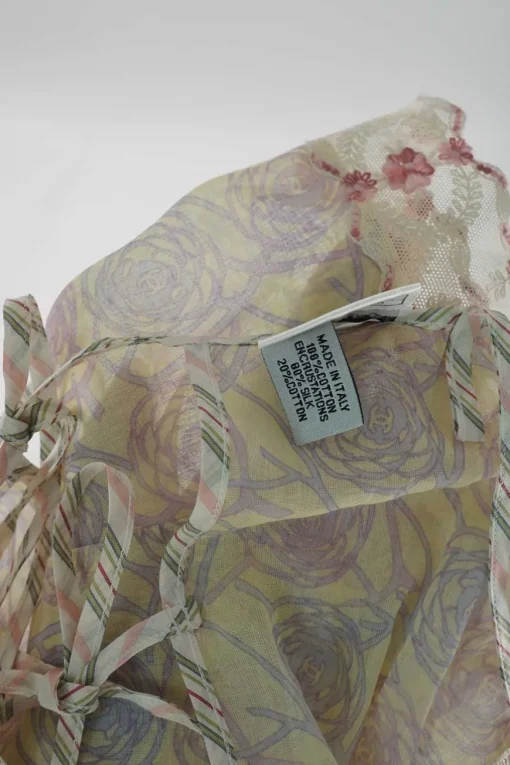 Yellow lace-trimmed semi-sheer cotton voile camellia print tie-back camisole with fixed straps