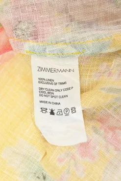 Yellow linen floral print stand collar plunge neck button-loop empire-waist midi dress with blouson sleeves