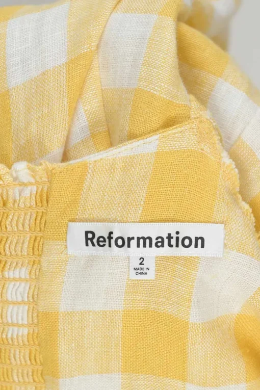 Yellow linen gingham puff sleeve sun dress with cutout at centre front