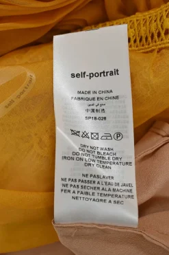 Yellow semi-sheer polyester cold-shoulder puff sleeve keyhole midi dress with A-line plissé skirt